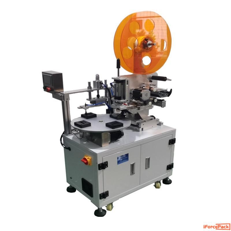 Turntable rotary type mold jig top pressing labeling machine